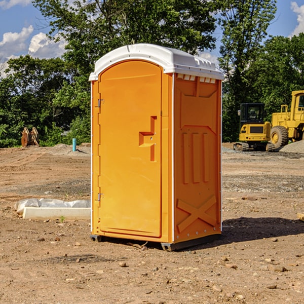 how often are the portable restrooms cleaned and serviced during a rental period in Harlem